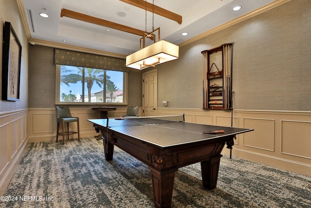 rec room featuring crown molding and a raised ceiling