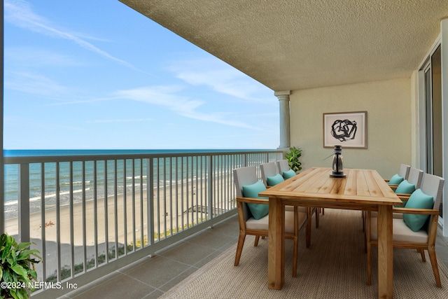 1031 1st St S Unit 504, Jacksonville Beach, FL 32250 - balcony featuring a water view and a beach view