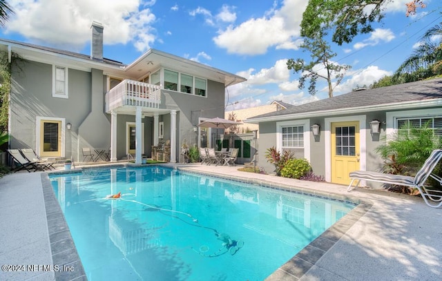 view of pool with a patio