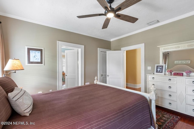 bedroom featuring ceiling fan, dark hardwood / wood-style flooring, and ornamental molding