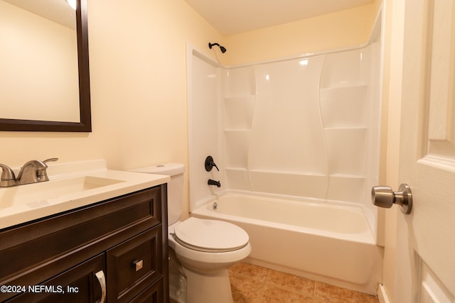 full bathroom with shower / bathing tub combination, tile patterned floors, vanity, and toilet