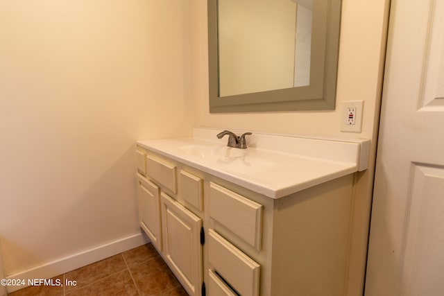 bathroom with vanity and tile patterned flooring