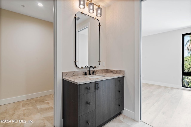 121 12th Ave S, Jacksonville Beach, FL 32250 - bathroom featuring vanity and baseboards