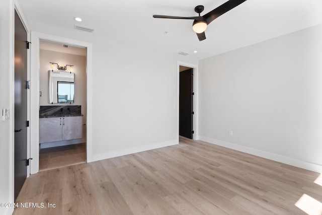 121 12th Ave S, Jacksonville Beach, FL 32250 - unfurnished bedroom featuring light wood-style flooring, connected bathroom, recessed lighting, baseboards, and ceiling fan