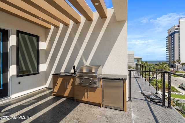 121 12th Ave S, Jacksonville Beach, FL 32250 - view of patio with a balcony and a sink
