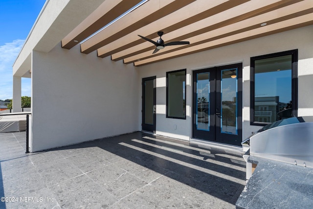 view of patio / terrace with ceiling fan, grilling area, and french doors