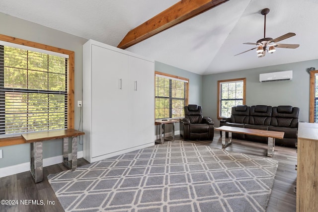 living area featuring a ceiling fan, vaulted ceiling with beams, wood finished floors, a wall mounted air conditioner, and baseboards