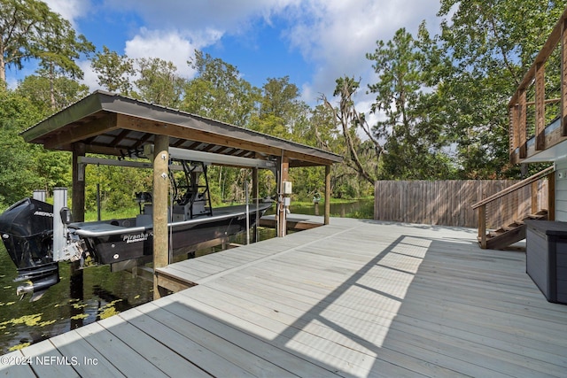 dock area featuring a water view