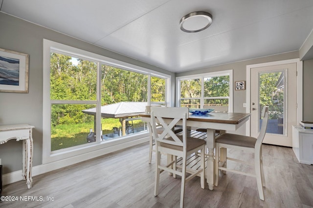 sunroom / solarium featuring plenty of natural light