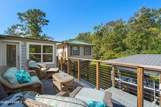 wooden deck with outdoor lounge area