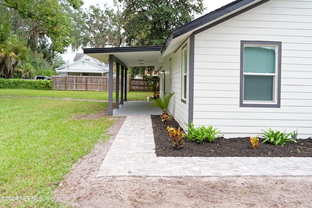 view of home's exterior featuring a lawn