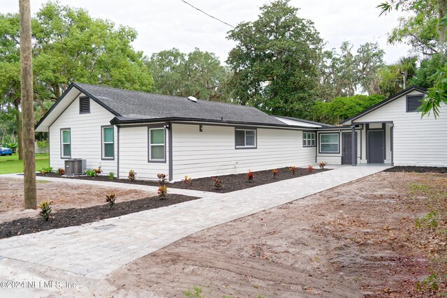 exterior space featuring central AC unit and a patio area