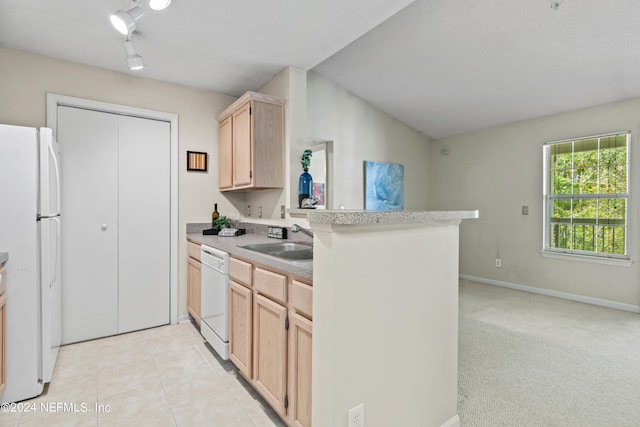 kitchen with light brown cabinets, white appliances, sink, kitchen peninsula, and light colored carpet