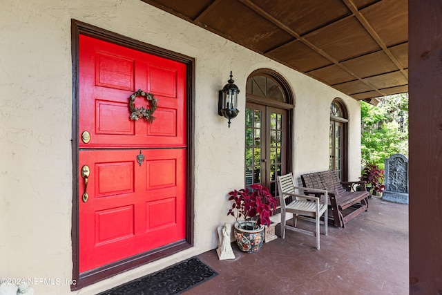 entrance to property with a porch