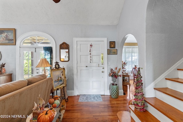 foyer featuring hardwood / wood-style flooring and a textured ceiling