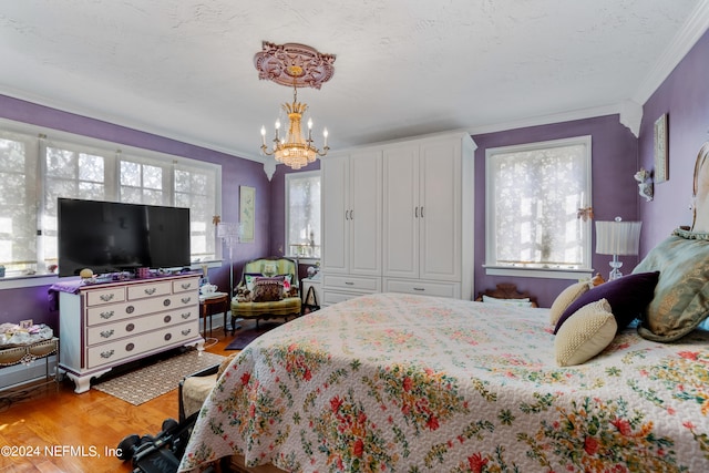 bedroom with multiple windows, wood-type flooring, and ornamental molding