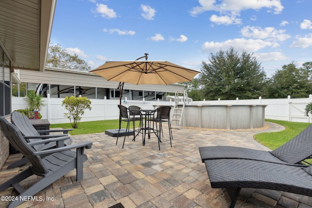 view of patio / terrace with exterior bar