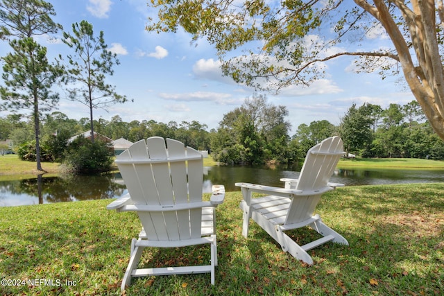 view of yard with a water view