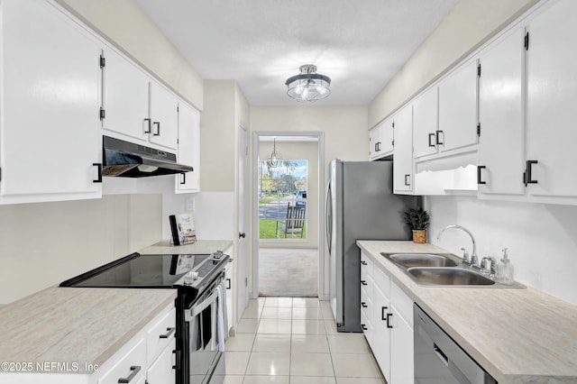 kitchen with white cabinetry, appliances with stainless steel finishes, under cabinet range hood, and a sink