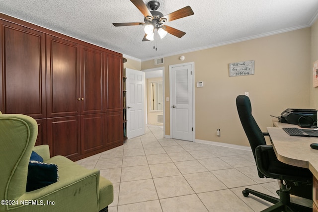 tiled office with a textured ceiling, ornamental molding, and ceiling fan