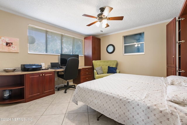 bedroom with ceiling fan, a textured ceiling, crown molding, and light tile patterned floors