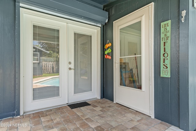 doorway to property featuring french doors