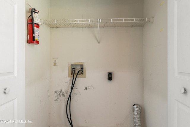 clothes washing area featuring washer hookup