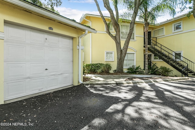 exterior space featuring a garage