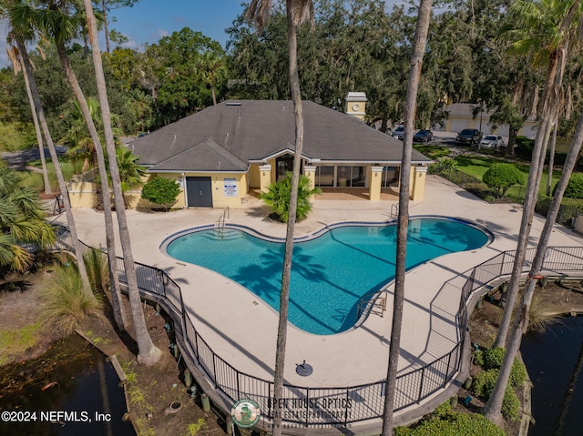 view of pool featuring a patio area