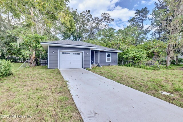 garage with a lawn