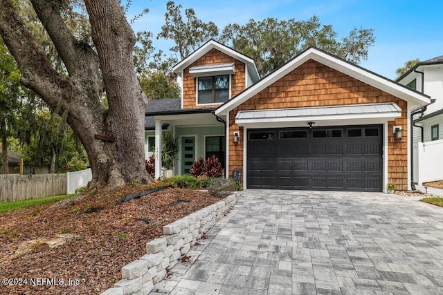 craftsman-style house featuring a garage