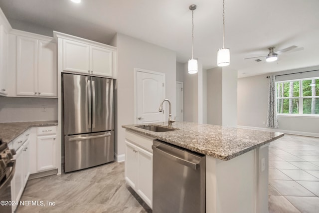 kitchen with white cabinets, ceiling fan, appliances with stainless steel finishes, and sink