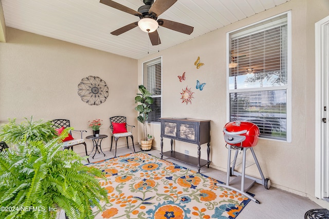 interior space featuring ceiling fan