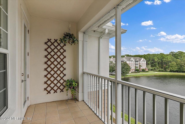 balcony featuring a water view