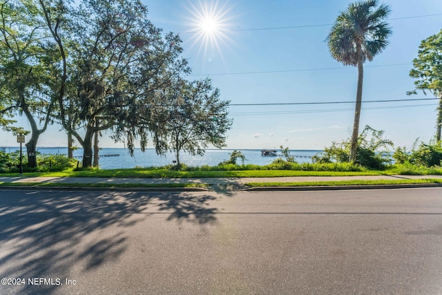 view of street with a water view