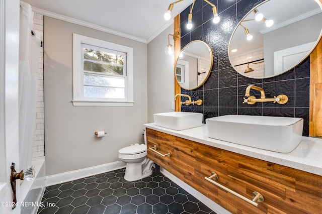 full bathroom featuring tile walls, vanity, ornamental molding, toilet, and tile patterned floors