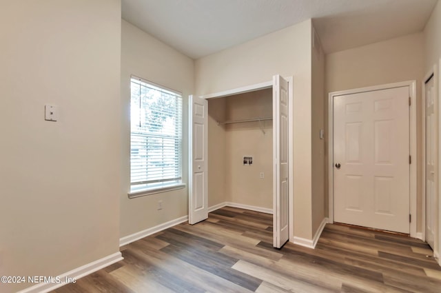 interior space featuring a closet and hardwood / wood-style flooring