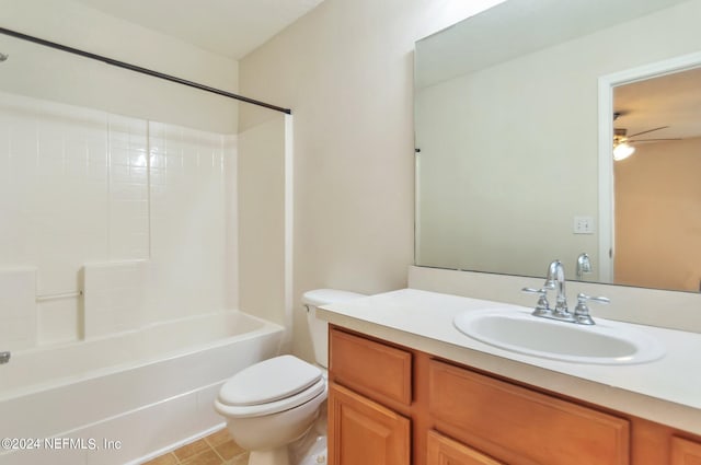 full bathroom featuring ceiling fan, tile patterned flooring, tub / shower combination, toilet, and vanity