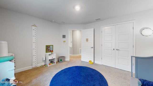 playroom with light colored carpet