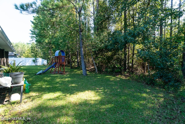 view of yard with a playground