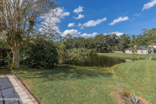 view of yard with a water view