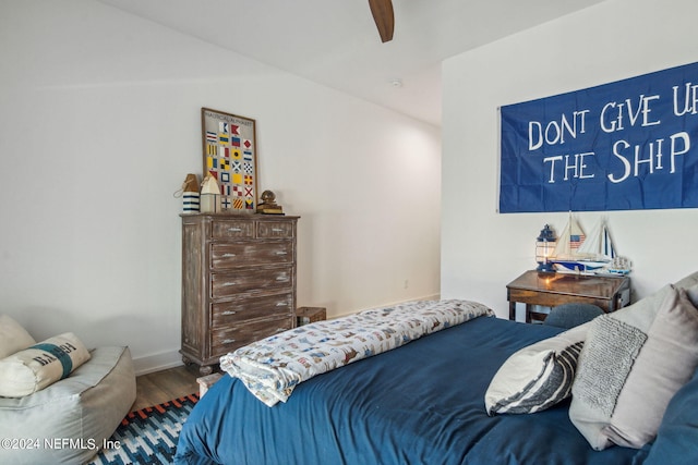 bedroom featuring ceiling fan and hardwood / wood-style flooring