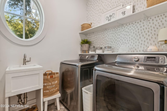 laundry room featuring separate washer and dryer