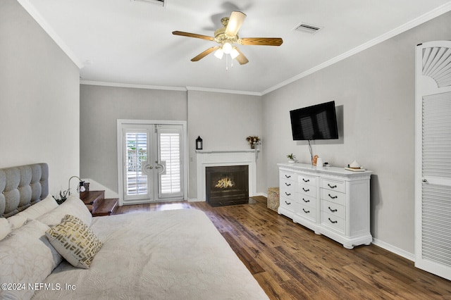 bedroom with ceiling fan, access to outside, ornamental molding, dark wood-type flooring, and french doors