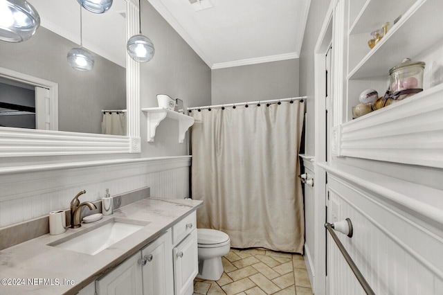 bathroom featuring vanity, toilet, crown molding, and curtained shower