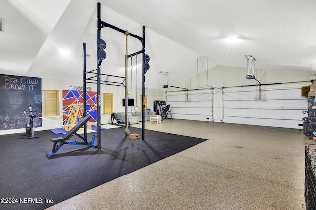 workout room featuring vaulted ceiling