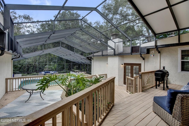 3565 Red Cloud Trl, Saint Augustine, FL 32086 - deck featuring glass enclosure, french doors, an outdoor pool, and a grill