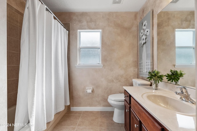 full bathroom featuring a textured ceiling, toilet, vanity, shower / tub combo with curtain, and tile patterned flooring