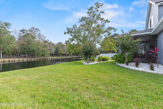 view of yard with a water view