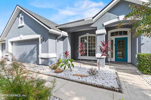 view of front of house with a garage